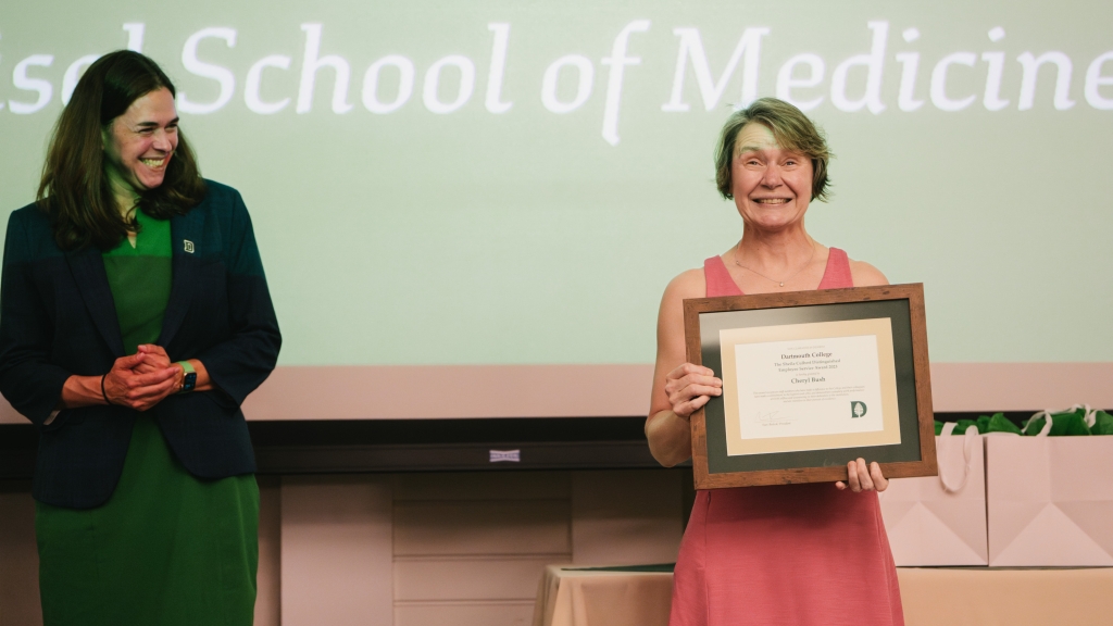 Cheryl Bush recieving the Sheila Culbert Distinguished Employee Award